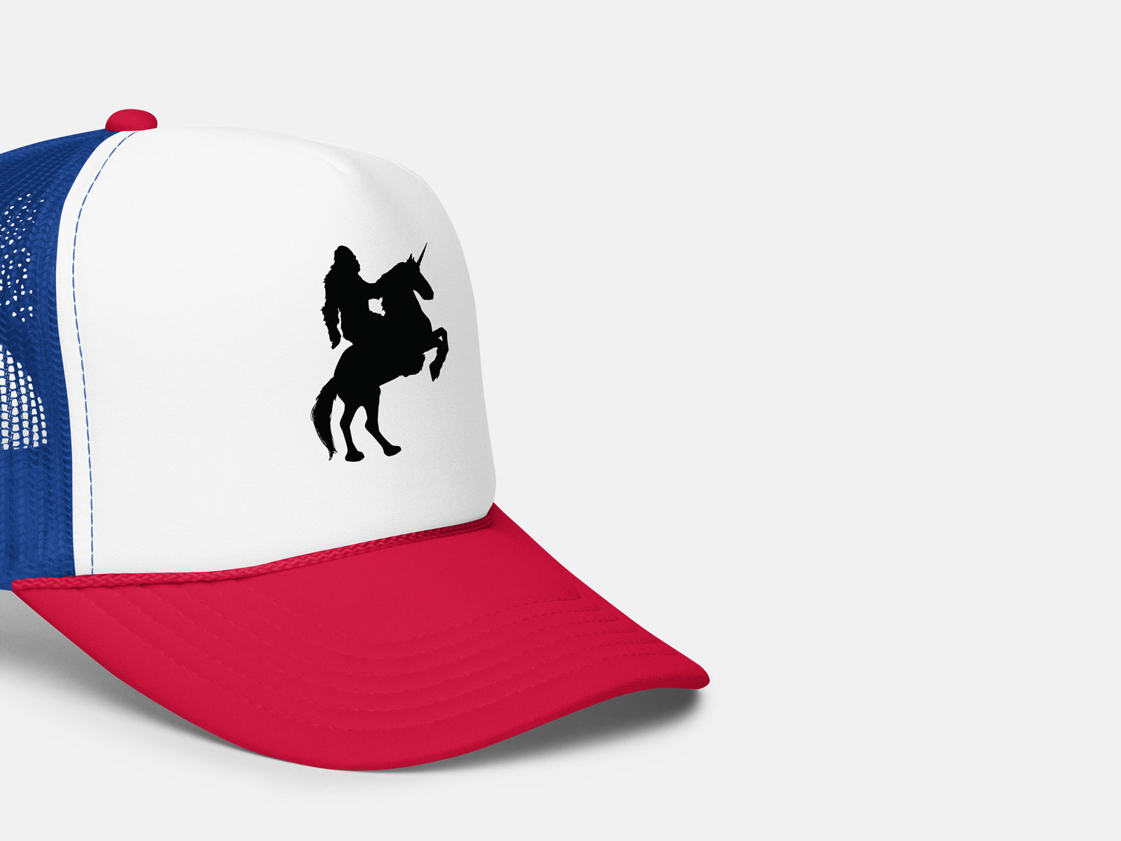 Sasquatch Riding a Unicorn Trucker Hat