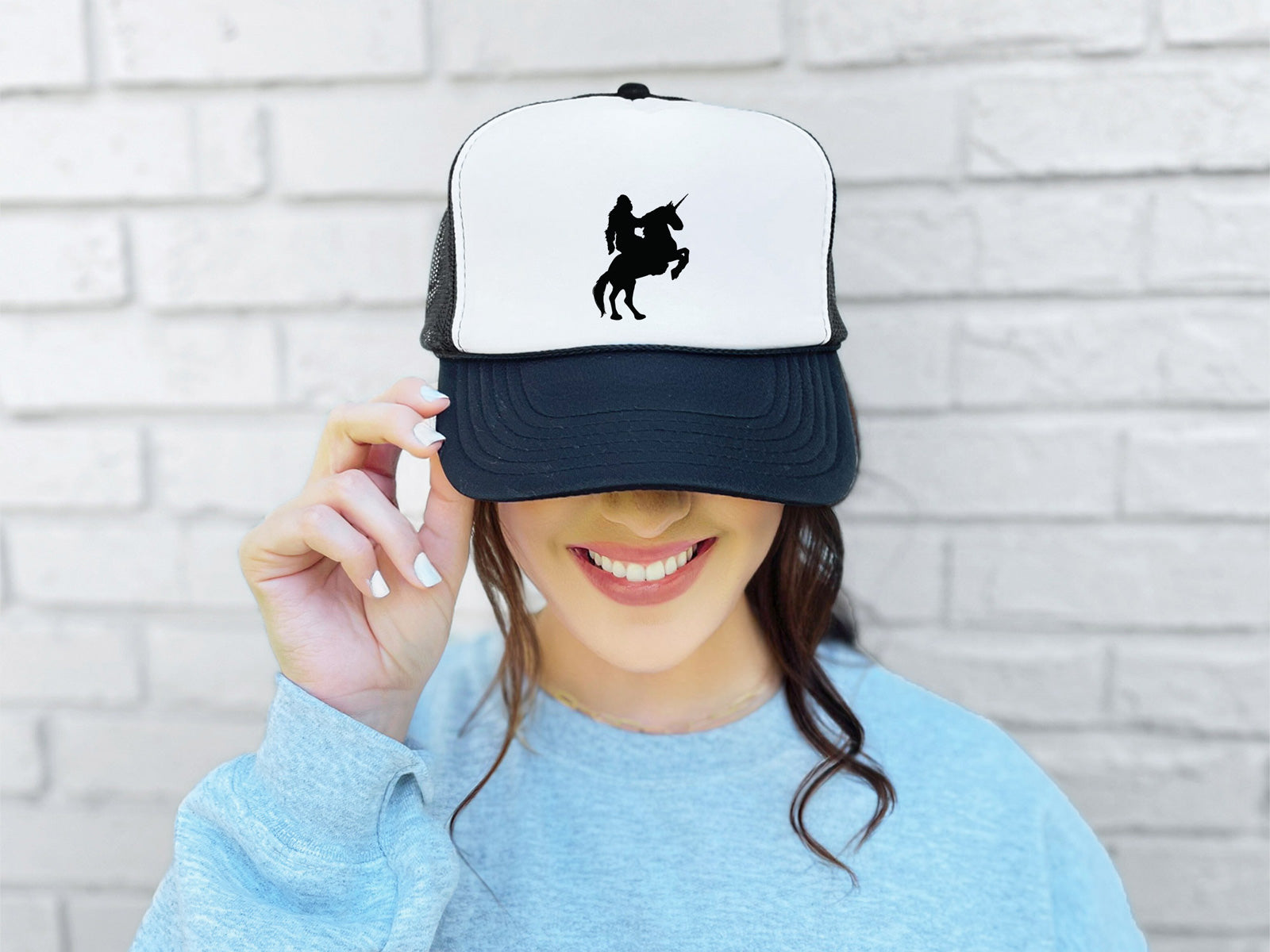Sasquatch Riding a Unicorn Trucker Hat